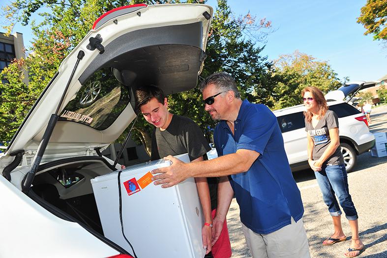 Student moving into college at RWU